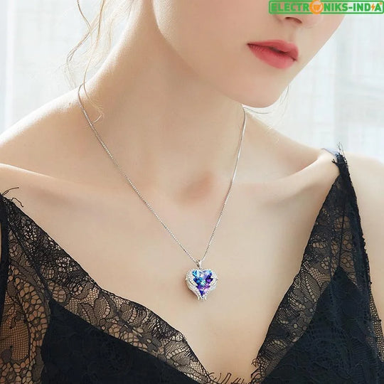 Navatulya® swarovski necklace women silver color embellished with crystals from angel wings heart pendant - on sale